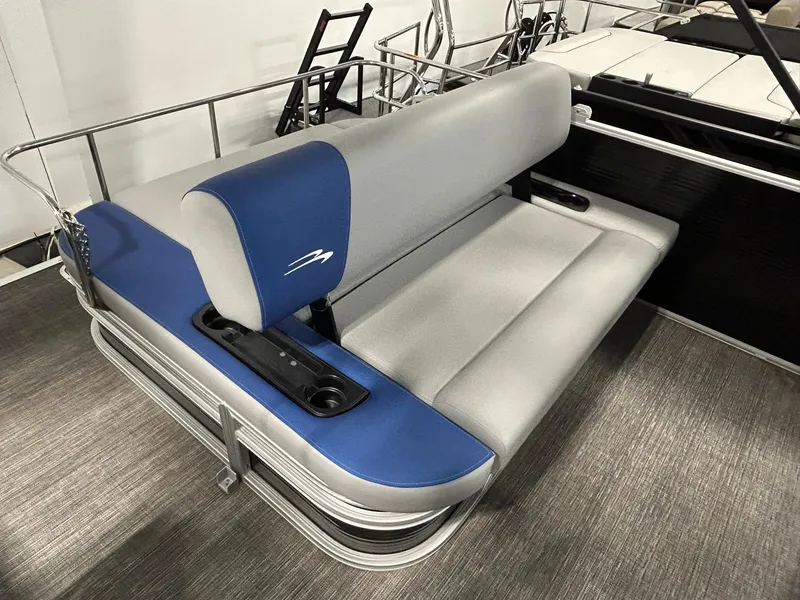 Slide: The Image of 2024 Bennington 22SSB boat seat with blue and gray upholstery. - 12
