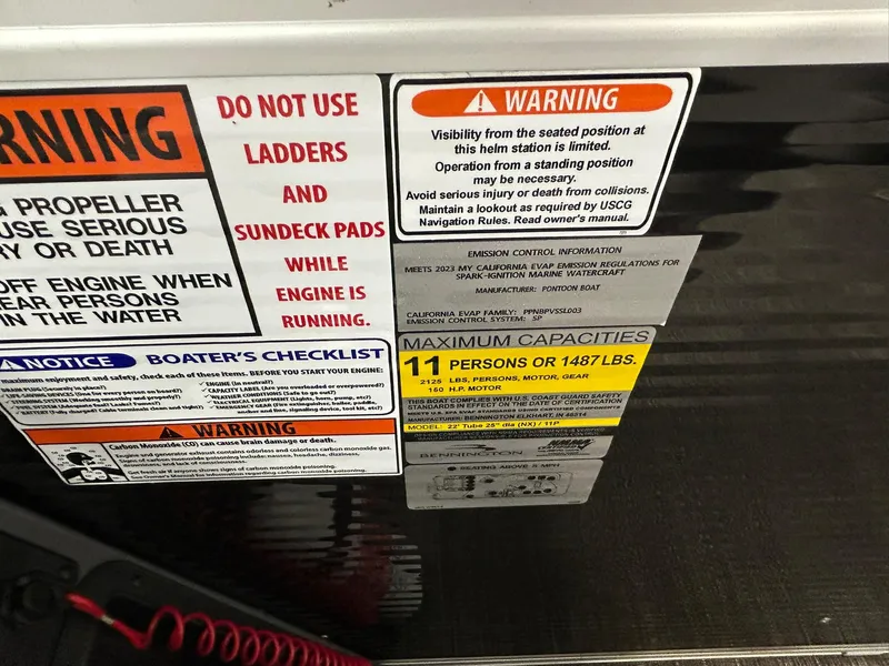 Slide: The Image of Safety warnings and capacity limits on a 2024 Bennington 22SSB boat. - 15