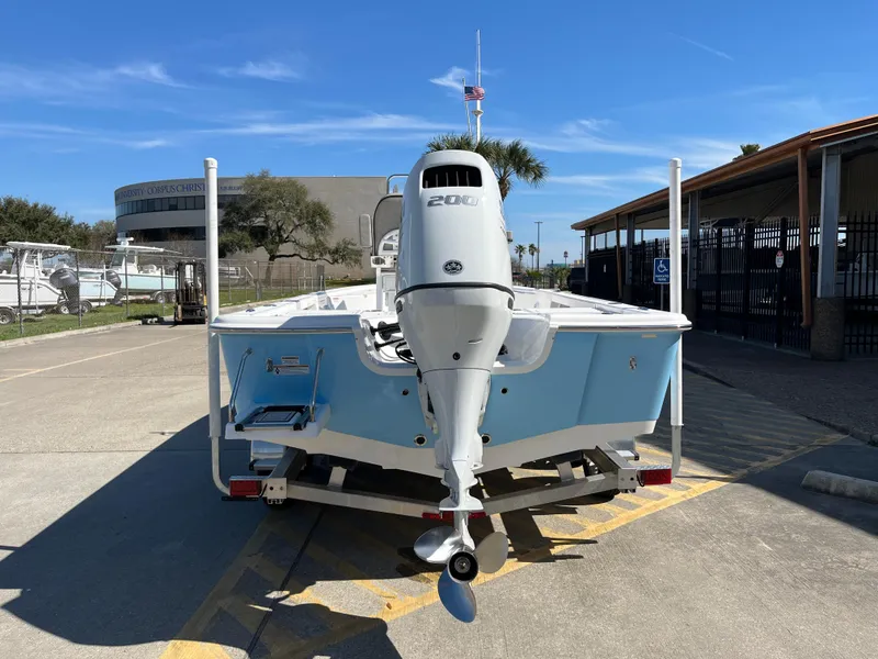 Slide: The Image of 2024 Sea Pro 230 Bay boat with outboard motor on trailer. - 32