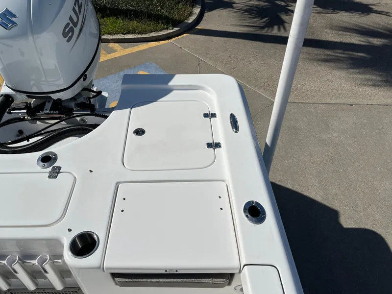Slide: The Image of 2024 Sea Pro 230 Bay boat stern with Suzuki outboard motor. - 44