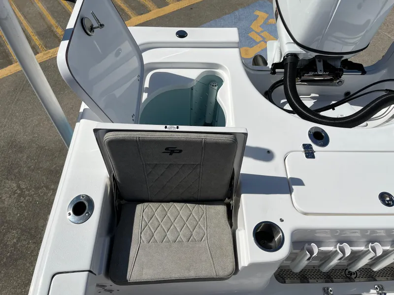 Slide: The Image of 2024 Sea Pro 230 Bay boat seating and storage compartment. - 48