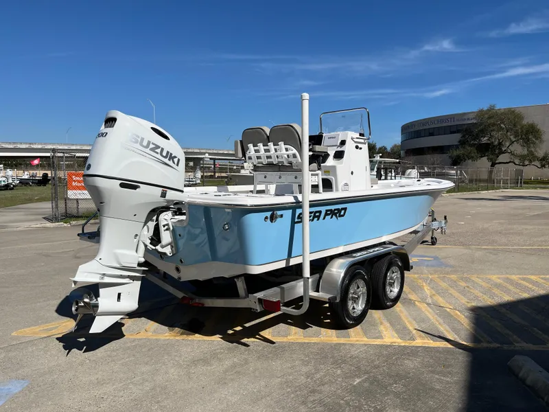 Slide: The Image of 2024 Sea Pro 230 Bay boat on a trailer with Suzuki outboard motor. - 5