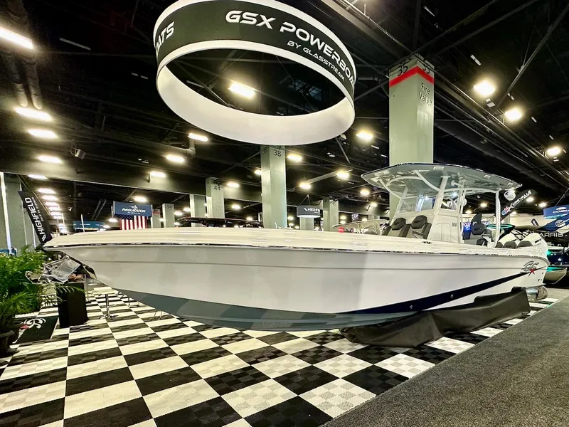 The Image of 2024 Glasstream 32 GSX boat displayed at an indoor boat show. - 0
