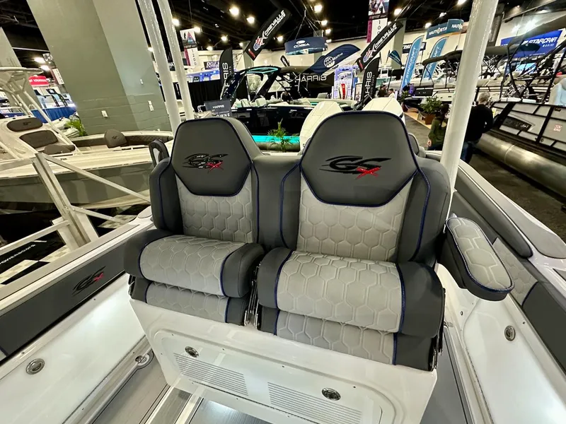 Slide: The Image of 2024 Glasstream 32 GSX boat seats at a boat show. - 11