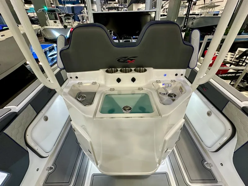 Slide: The Image of 2024 Glasstream 32 GSX boat console with seating and storage compartments. - 15