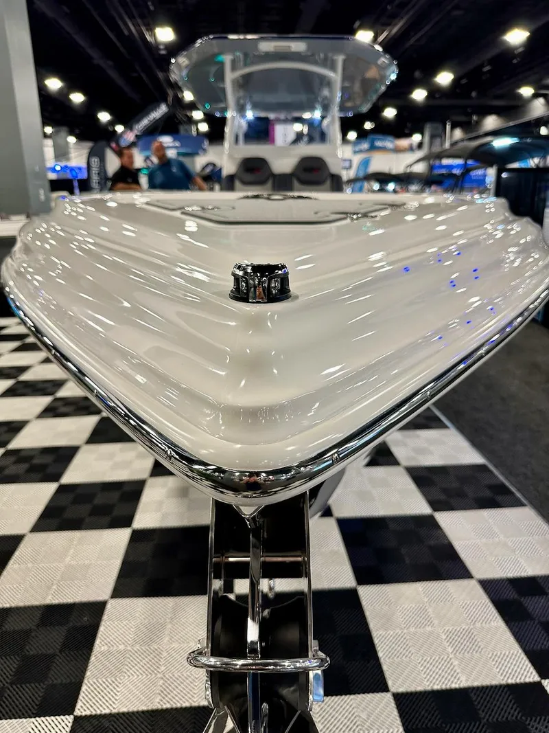 Slide: The Image of 2024 Glasstream 32 GSX boat showcased at an indoor event. - 23