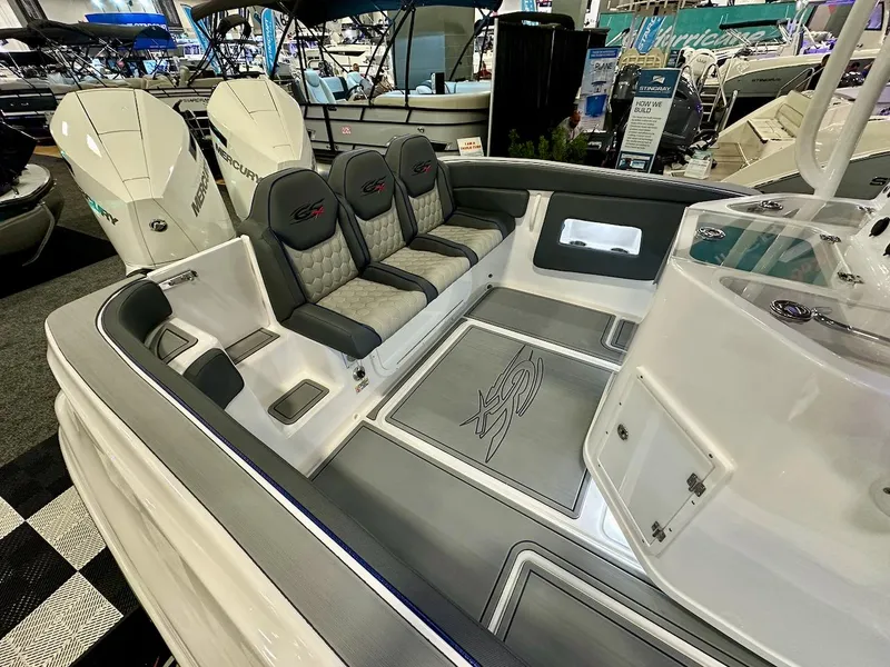 Slide: The Image of 2024 Glasstream 32 GSX boat interior with seating and twin outboard engines. - 4