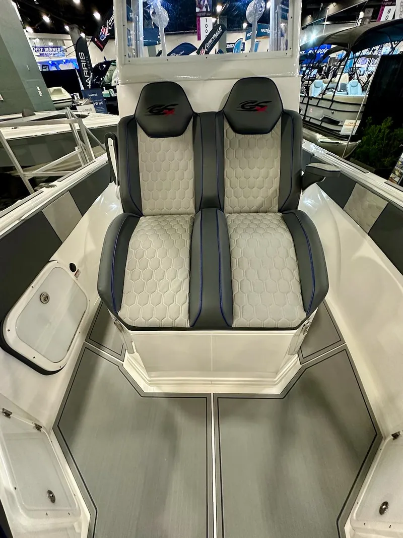 Slide: The Image of 2024 Glasstream 32 GSX boat interior with dual cushioned seats. - 9