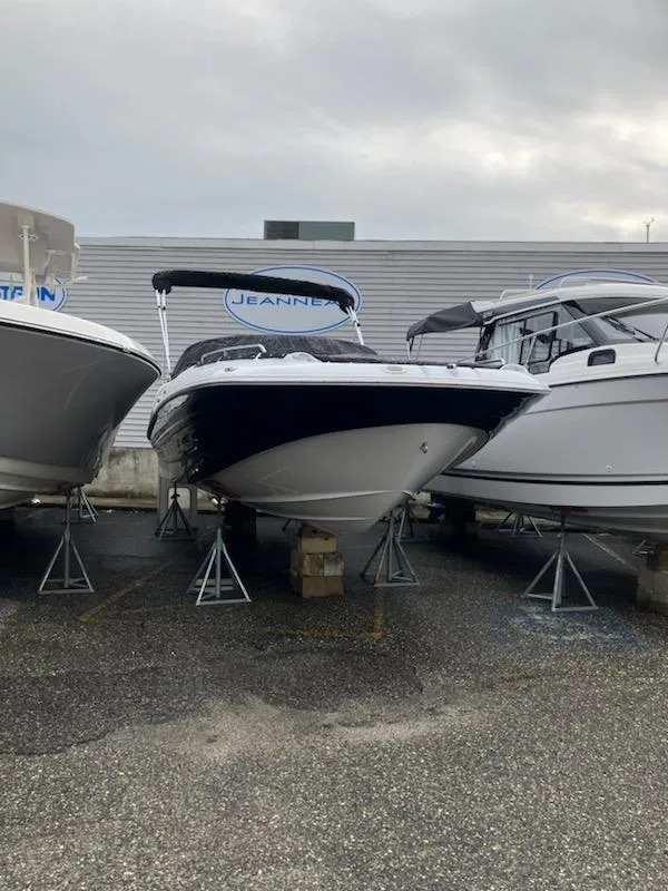 Slide: The Image of 2024 SouthWind 2400 SD boat on stands in a marina. - 3