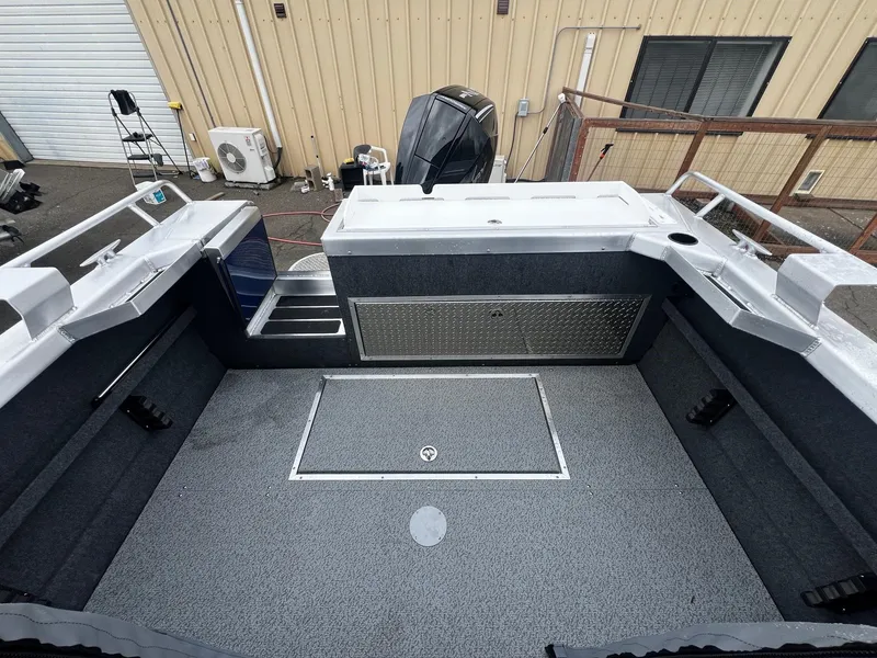 Slide: The Image of 2024 Thunder Jet 20 Chinook OS boat interior with spacious deck and storage compartments. - 14