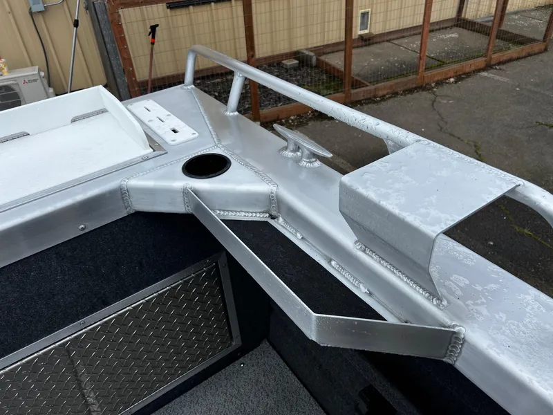 Slide: The Image of 2024 Thunder Jet 20 Chinook OS boat interior, featuring aluminum construction and storage compartments. - 18