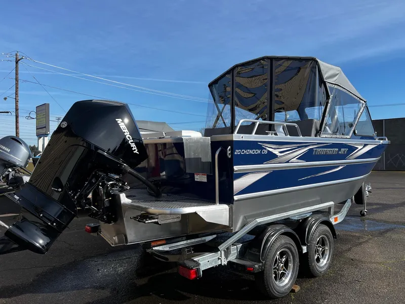 Slide: The Image of 2024 Thunder Jet 20 Chinook OS boat with Mercury outboard motor on trailer. - 2