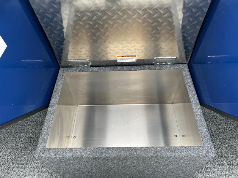 Slide: The Image of Open storage compartment in 2024 Thunder Jet 20 Chinook OS boat. - 9