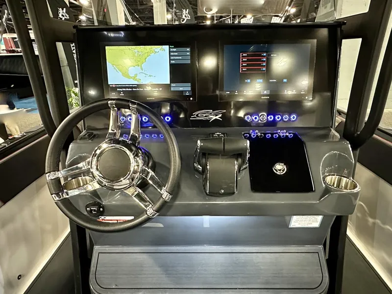 Slide: The Image of 2024 Glasstream 36 GSX boat dashboard with dual screens and modern controls. - 2