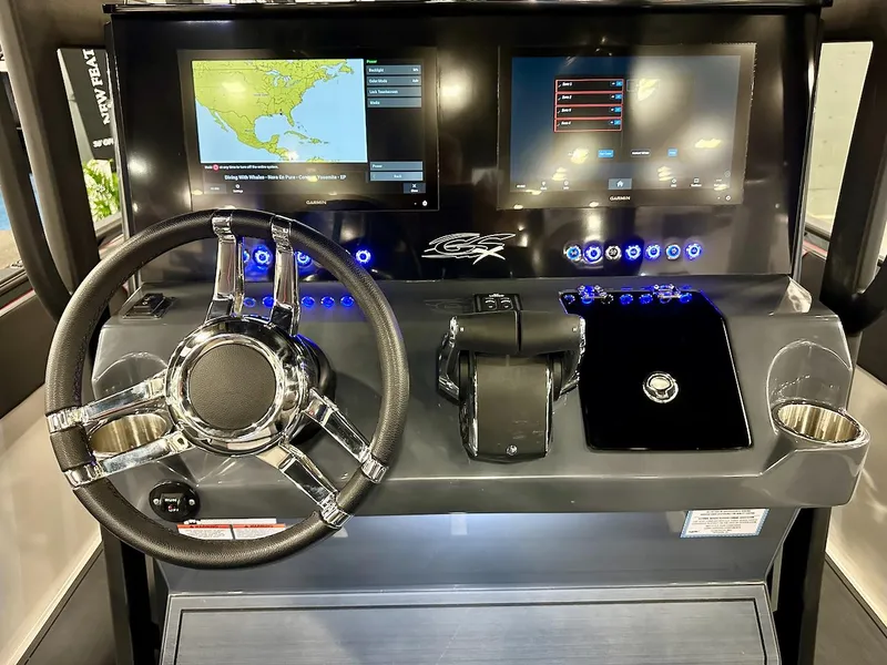 Slide: The Image of 2024 Glasstream 36 GSX boat dashboard with dual screens and modern controls. - 3