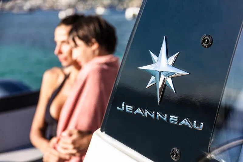 Slide: The Image of 2024 Jeanneau NC 795 Weekender S2 boat with people in the background. - 41