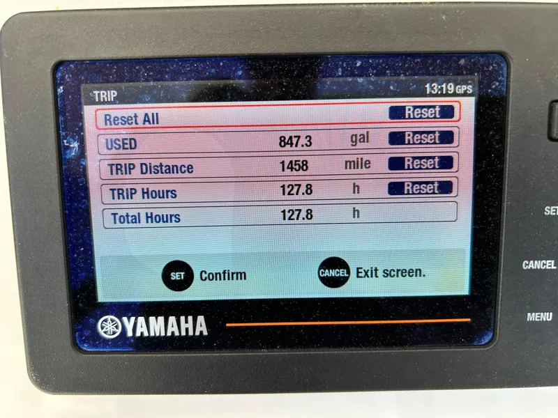 Slide: The Image of Yamaha display showing trip data: 847.3 gallons used, 1458 miles, 127.8 hours on Regulator 26XO. - 13