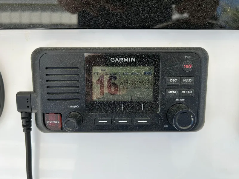 Slide: The Image of Garmin marine radio on 2020 Regulator 26XO boat dashboard. - 25