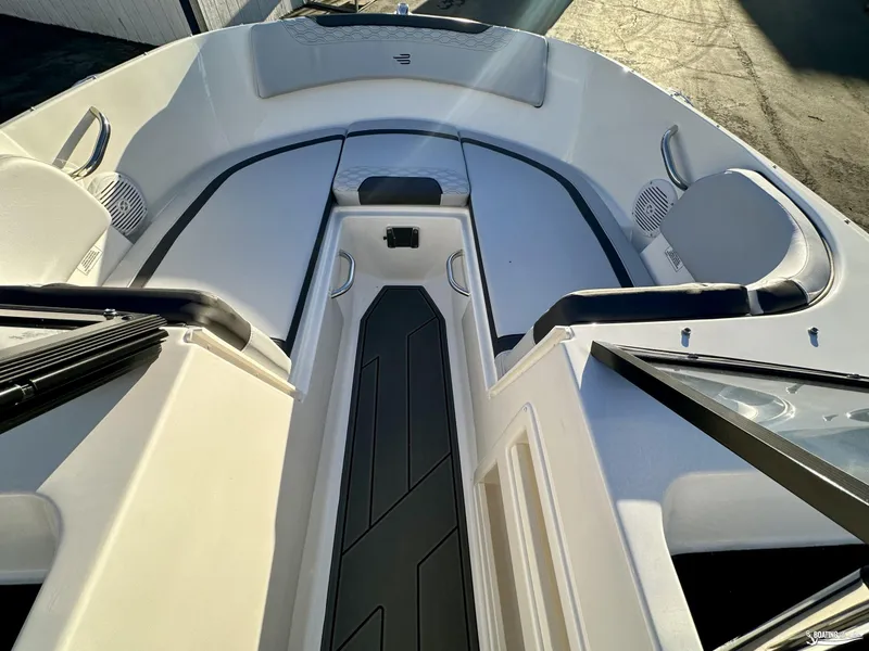 Slide: The Image of 2025 Bayliner M17 boat interior with sleek seating and modern design. - 7