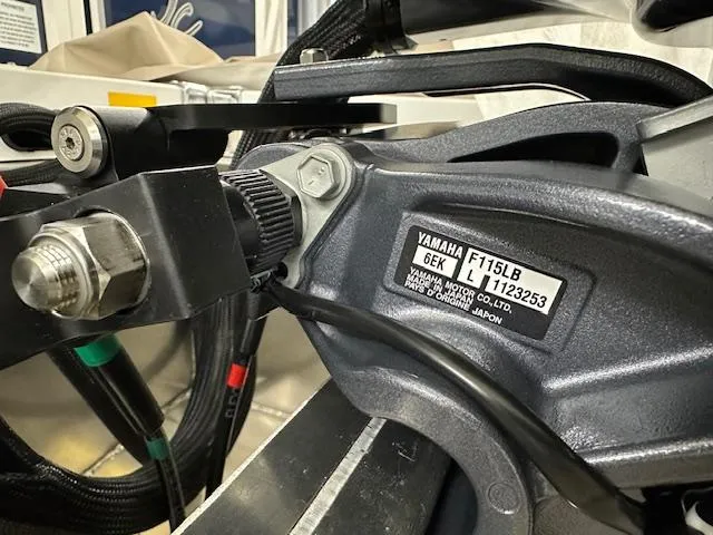 Slide: The Image of Close-up of Yamaha F115LB engine on 2024 JC Spirit 221 TT Sport boat. - 20