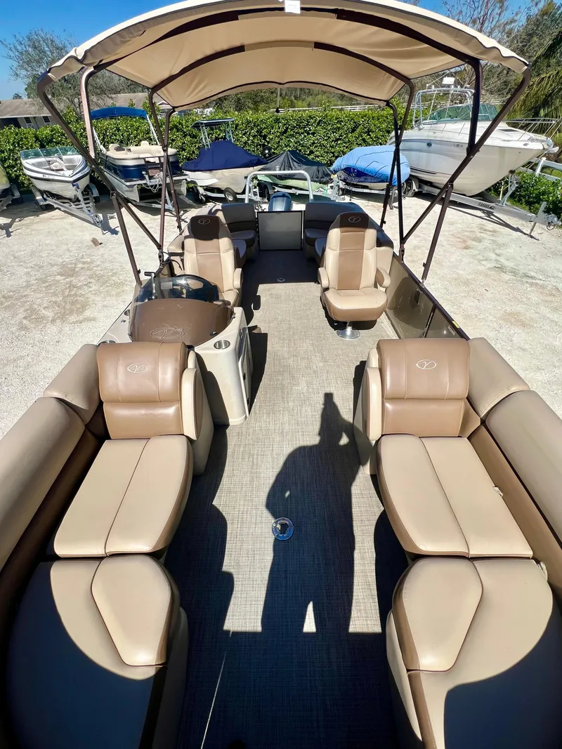 Slide: The Image of 2016 Crest Veranda V2275RC pontoon boat with tan seating and canopy. - 10