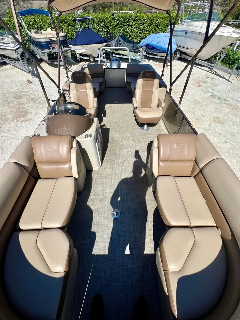 Slide: The Image of 2016 Crest Veranda V2275RC pontoon boat with tan seating and canopy. - 11