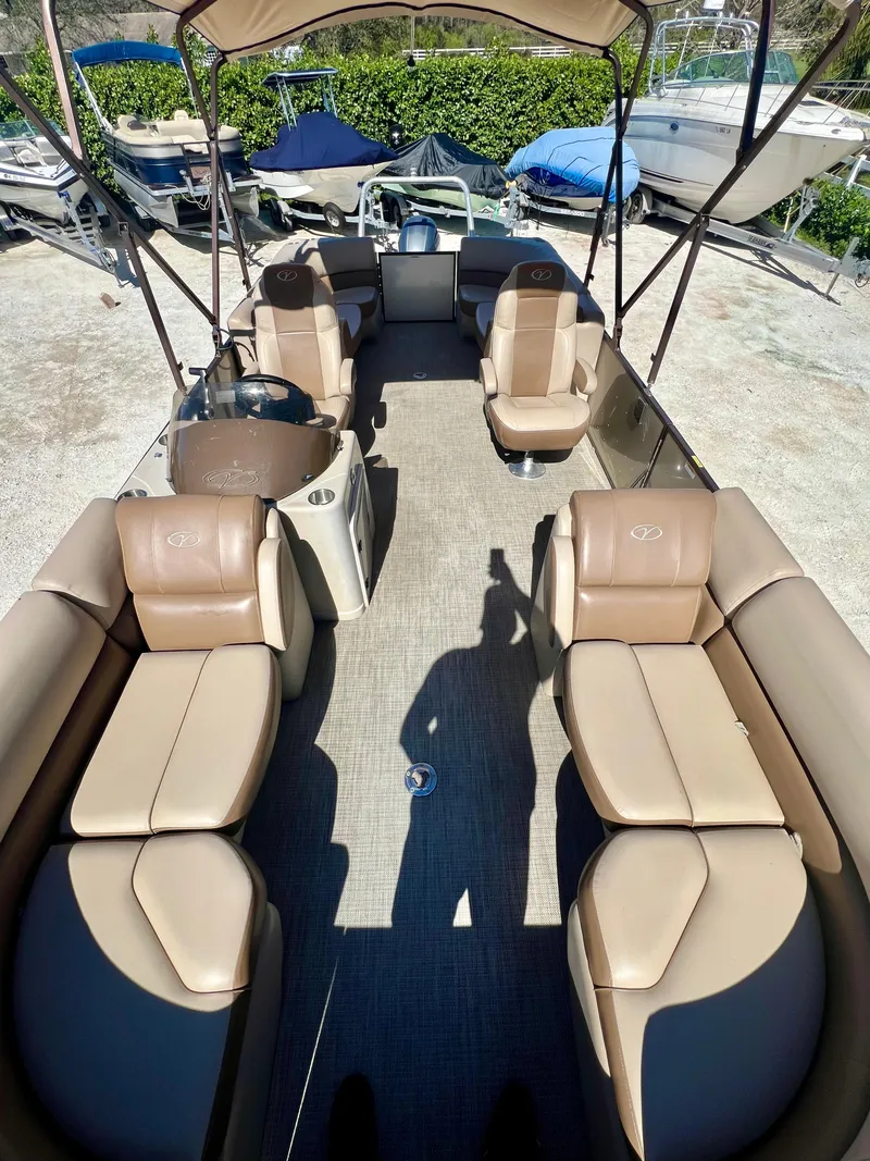 Slide: The Image of 2016 Crest Veranda V2275RC pontoon boat with tan seating and canopy. - 12
