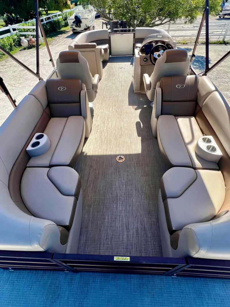 Slide: The Image of 2016 Crest Veranda V2275RC pontoon boat with spacious seating and modern design. - 14