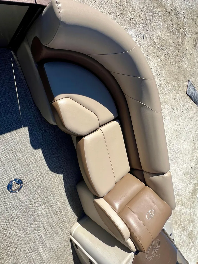 Slide: The Image of 2016 Crest Veranda V2275RC boat seating with beige and brown upholstery. - 17