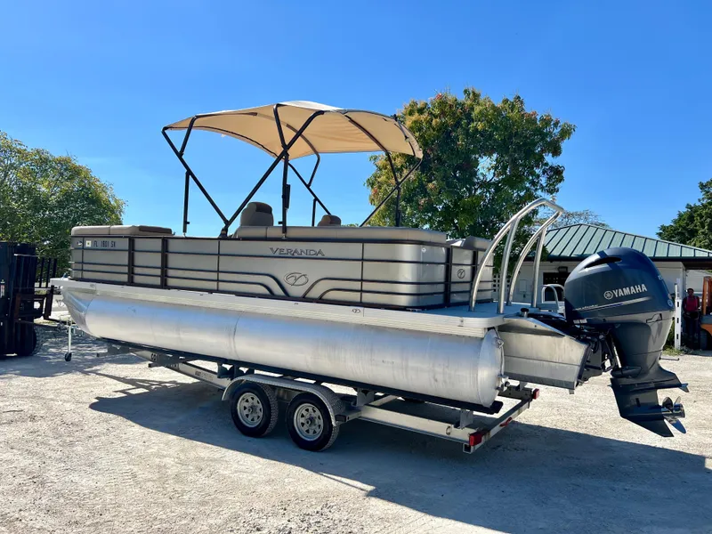 Slide: The Image of 2016 Crest Veranda V2275RC pontoon boat on trailer with Yamaha outboard motor. - 5