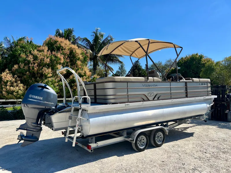 Slide: The Image of 2016 Crest Veranda V2275RC pontoon boat on a trailer with Yamaha outboard motor. - 8