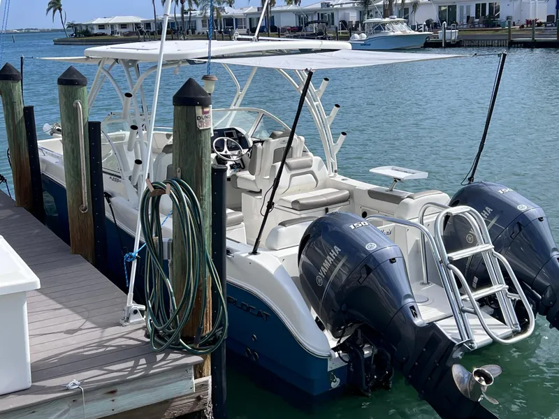 Slide: The Image of 2019 World Cat 255 DC boat interior with water view. - 17