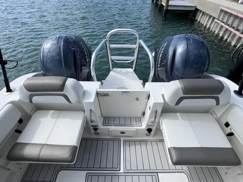 Slide: The Image of 2019 World Cat 255 DC boat interior with spacious seating area. - 22