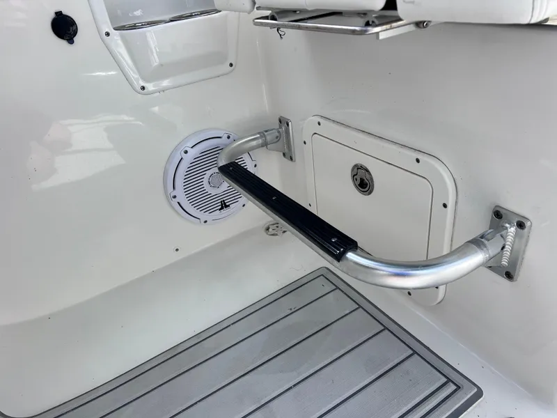 Slide: The Image of 2019 World Cat 255 DC boat with twin Yamaha 150 engines on water. - 47