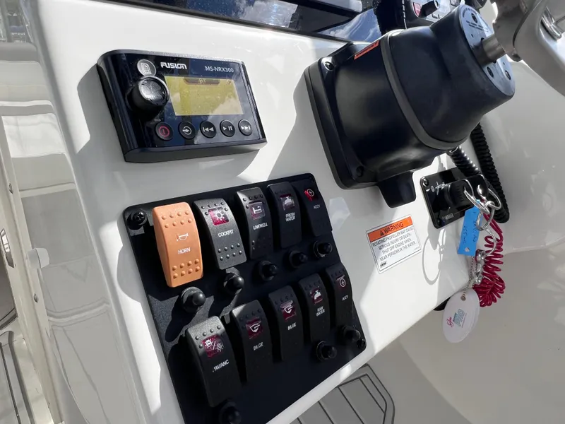 Slide: The Image of 2019 World Cat 255 DC boat interior with seating and modern design. - 51