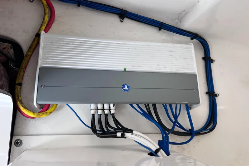 Slide: The Image of 2019 World Cat 255 DC boat interior with comfortable seating and cup holders. - 58