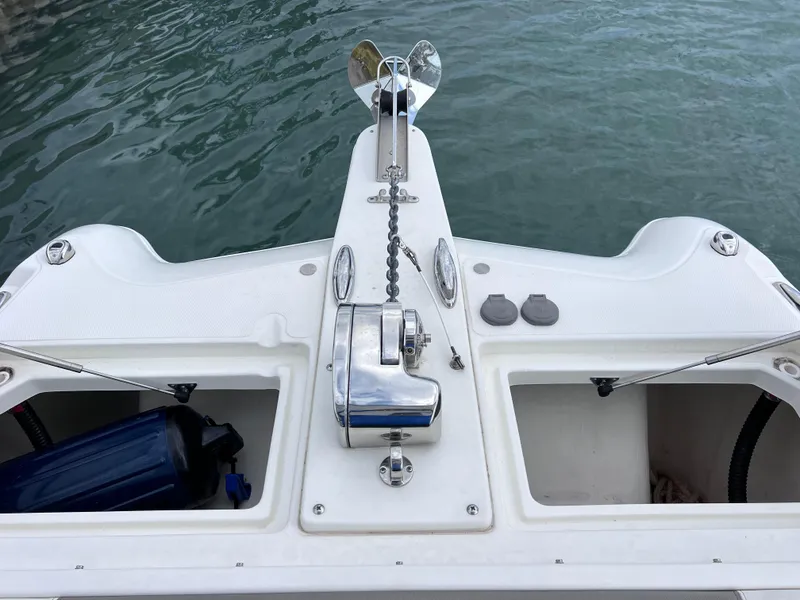 Slide: The Image of Luxury seating on 2019 World Cat 255 DC boat, featuring plush upholstery. - 59