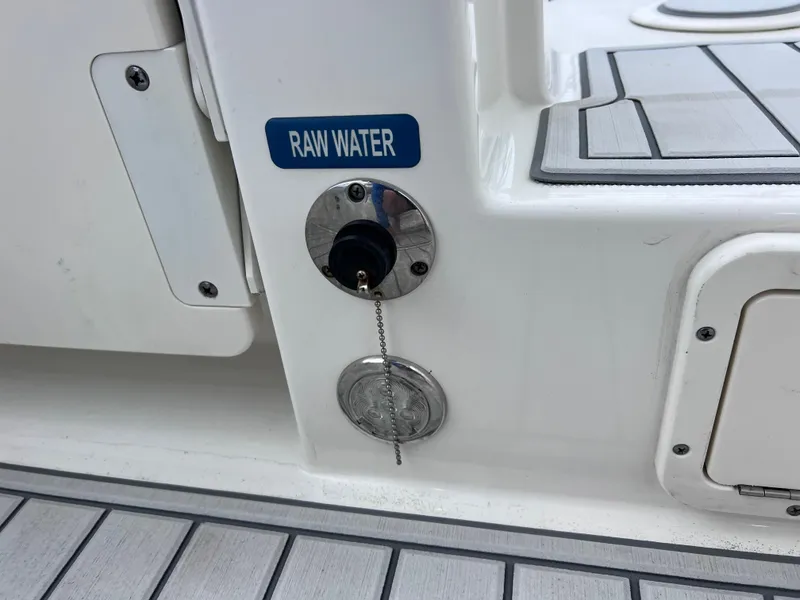 Slide: The Image of 2019 World Cat 255 DC boat helm with Garmin navigation system and steering wheel. - 62