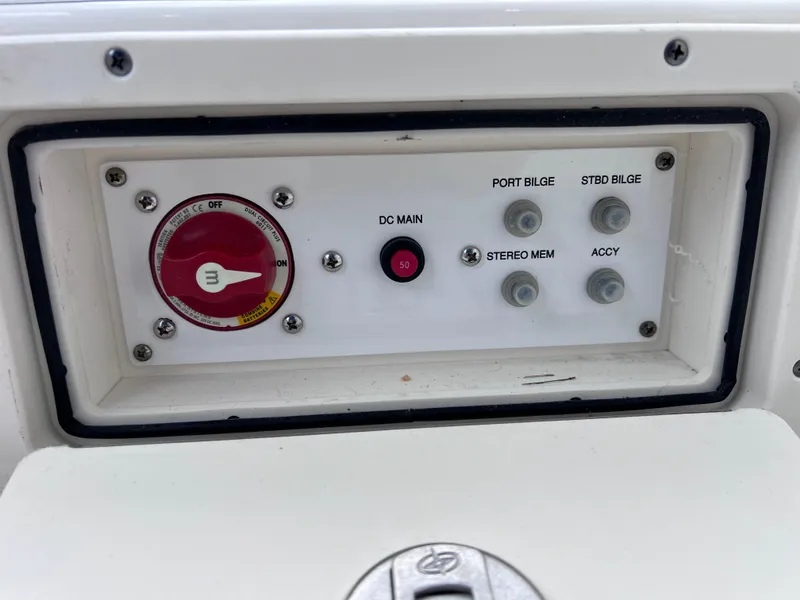 Slide: The Image of 2019 World Cat 255 DC helm with Garmin navigation and control systems. - 64