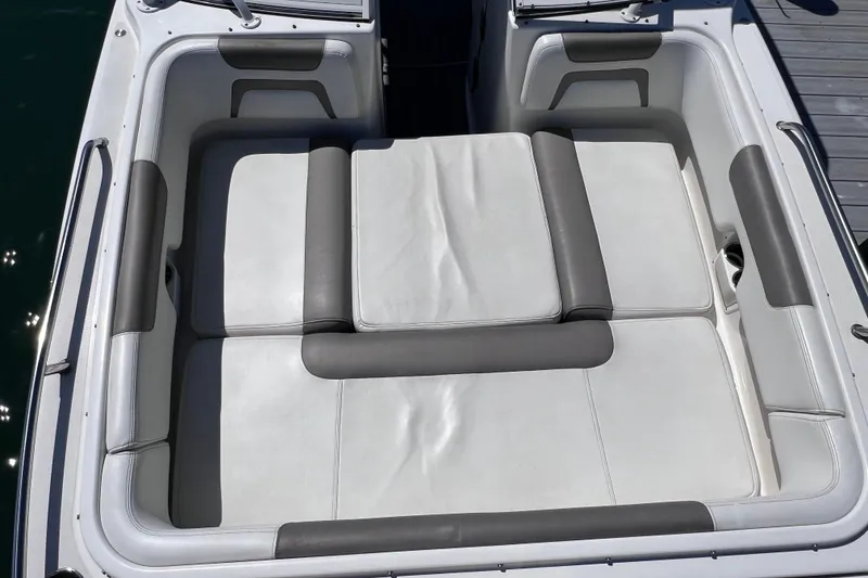 Slide: The Image of 2019 World Cat 255 DC boat interior with cushioned seating area. - 73