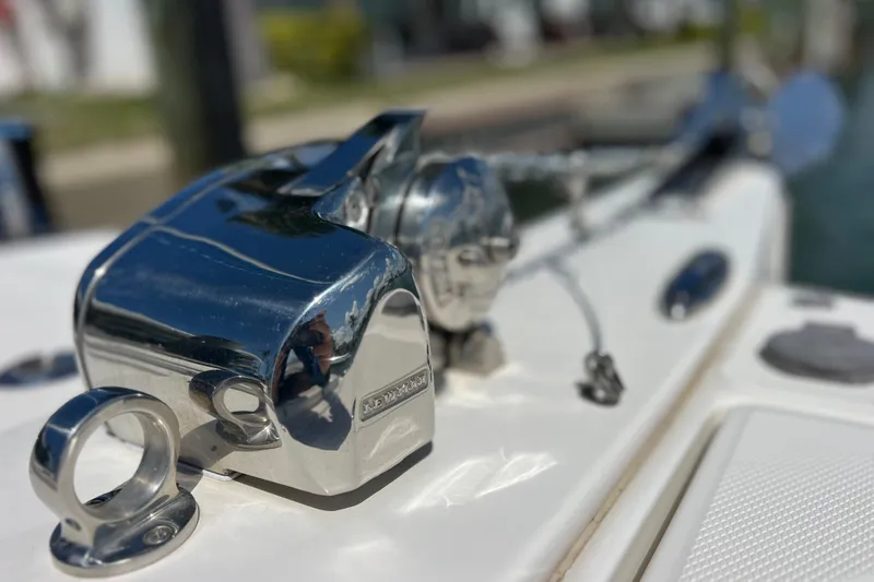 Slide: The Image of Close-up of a 2019 World Cat 255 DC boat's shiny metal hardware. - 74