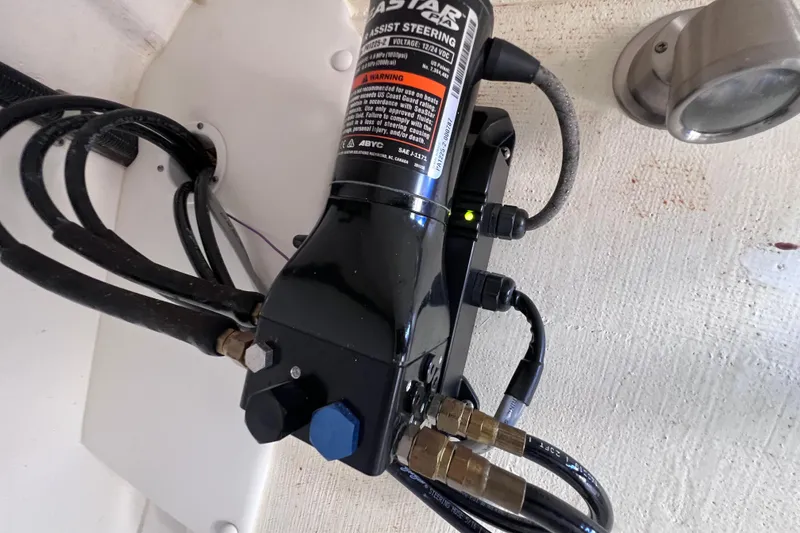 Slide: The Image of 2019 World Cat 255 DC hydraulic steering system with cables and connectors. - 78