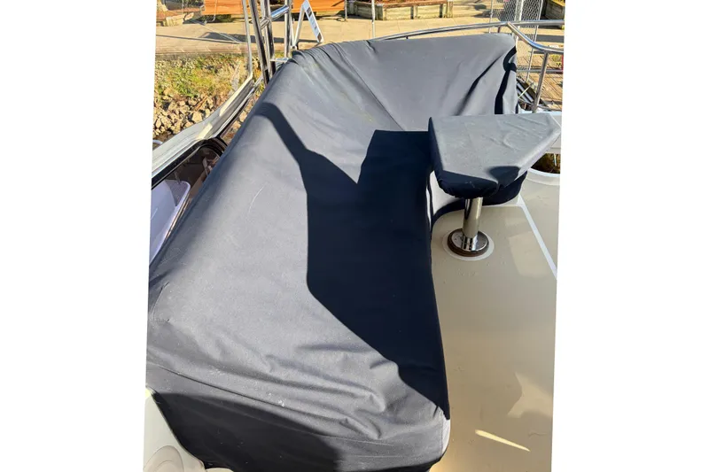 Slide: The Image of Interior of 2007 Grand Banks 47 Eastbay FB with cozy seating. - 25