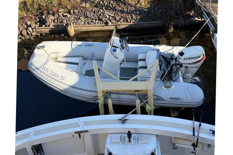 Slide: The Image of Luxurious 2007 Grand Banks 47 Eastbay FB yacht interior with plush seating and scenic views. - 26