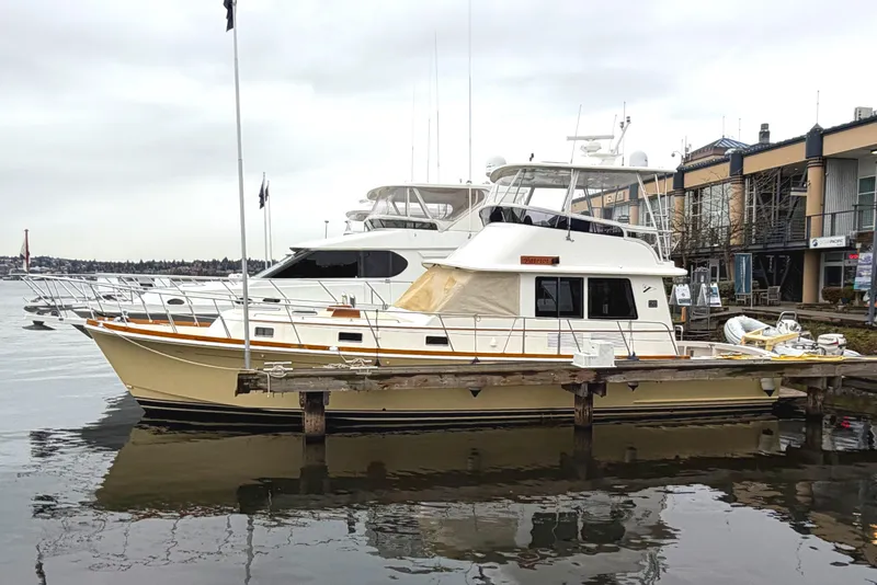 Slide: The Image of Luxurious 2007 Grand Banks 47 Eastbay FB yacht interior with wooden cabinetry and granite countertops. - 32