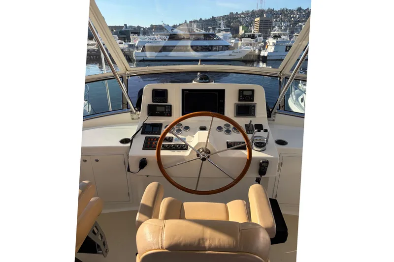 Slide: The Image of Helm of 2007 Grand Banks 47 Eastbay FB in harbor. - 49