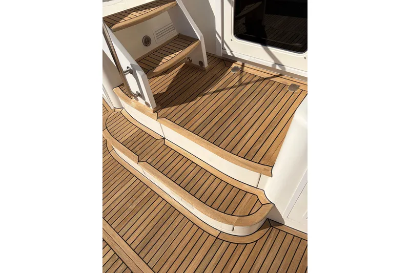 Slide: The Image of Teak deck steps on 2007 Grand Banks 47 Eastbay FB yacht. - 13