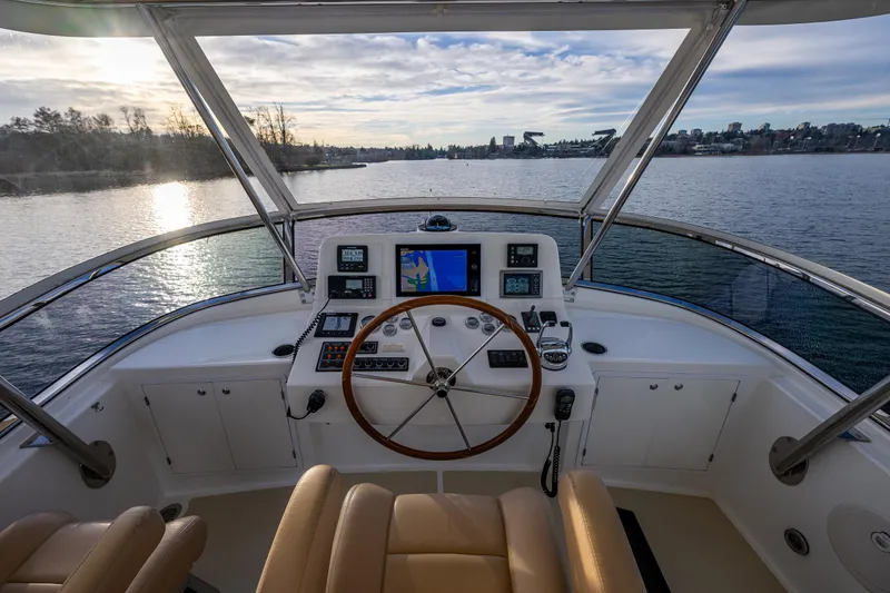Slide: The Image of 2007 Grand Banks 47 Eastbay FB helm with scenic water view at sunset. - 55