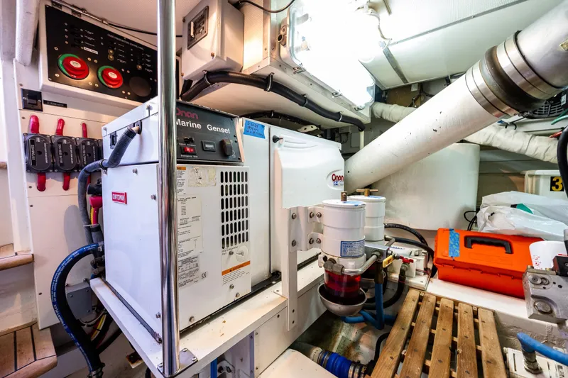 Slide: The Image of Engine room of 2007 Grand Banks 47 Eastbay FB with Onan marine generator. - 72