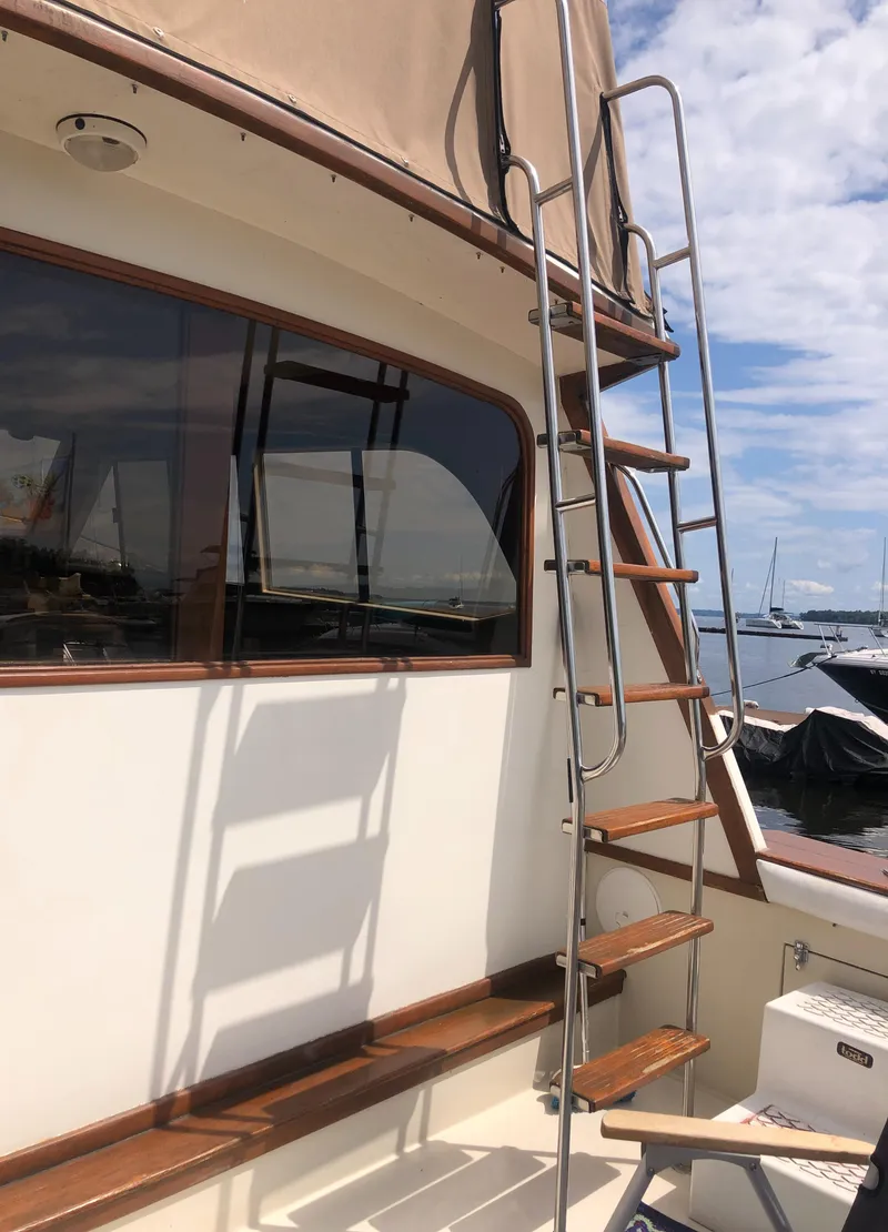 Slide: The Image of 1987 Egg Harbor Convertible 37 with ladder and window. - 10